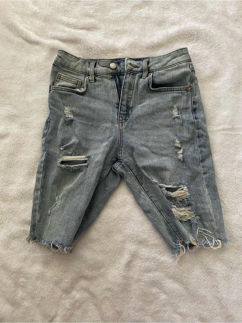 Distressed Light Wash Denim Cutoff Shorts